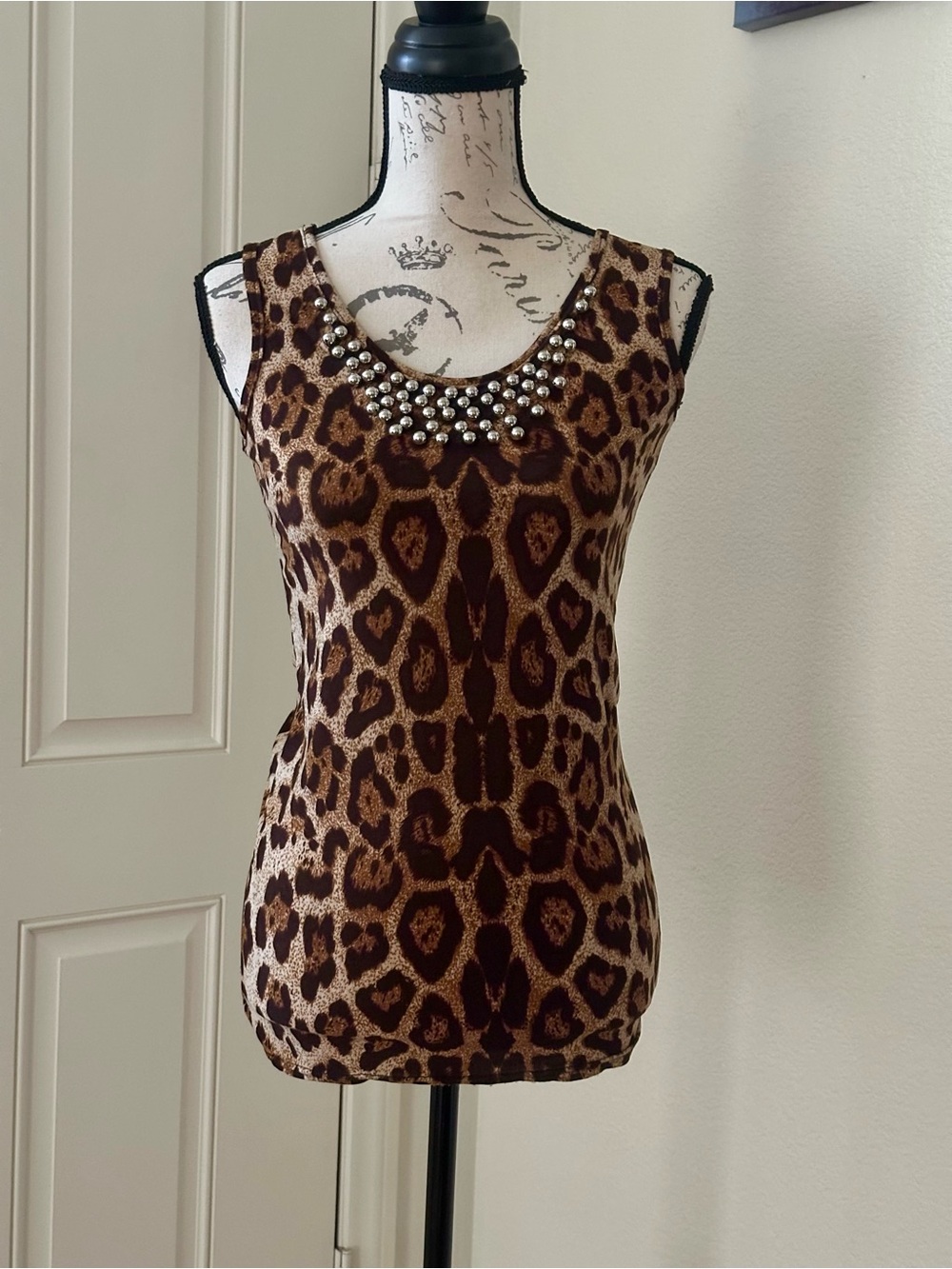 Leopard print top with silver balls design